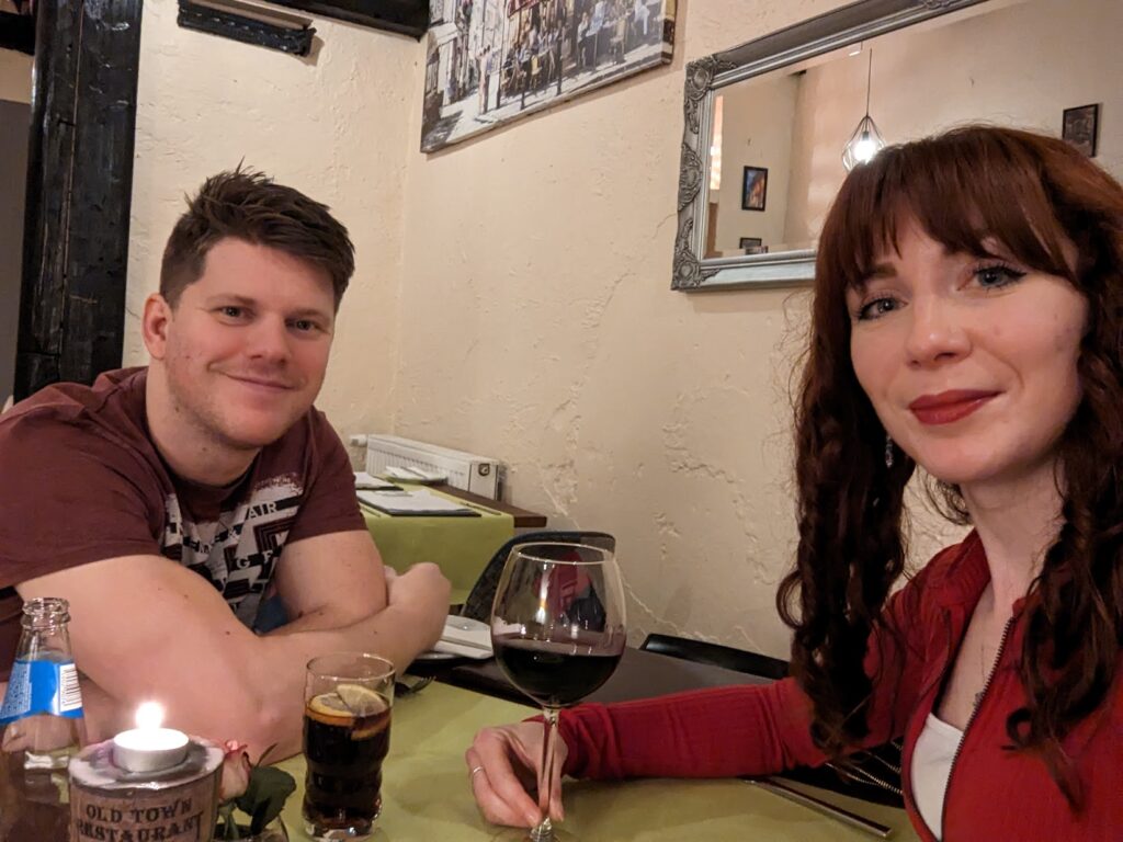 A photo of me and my husband enjoying our meal.