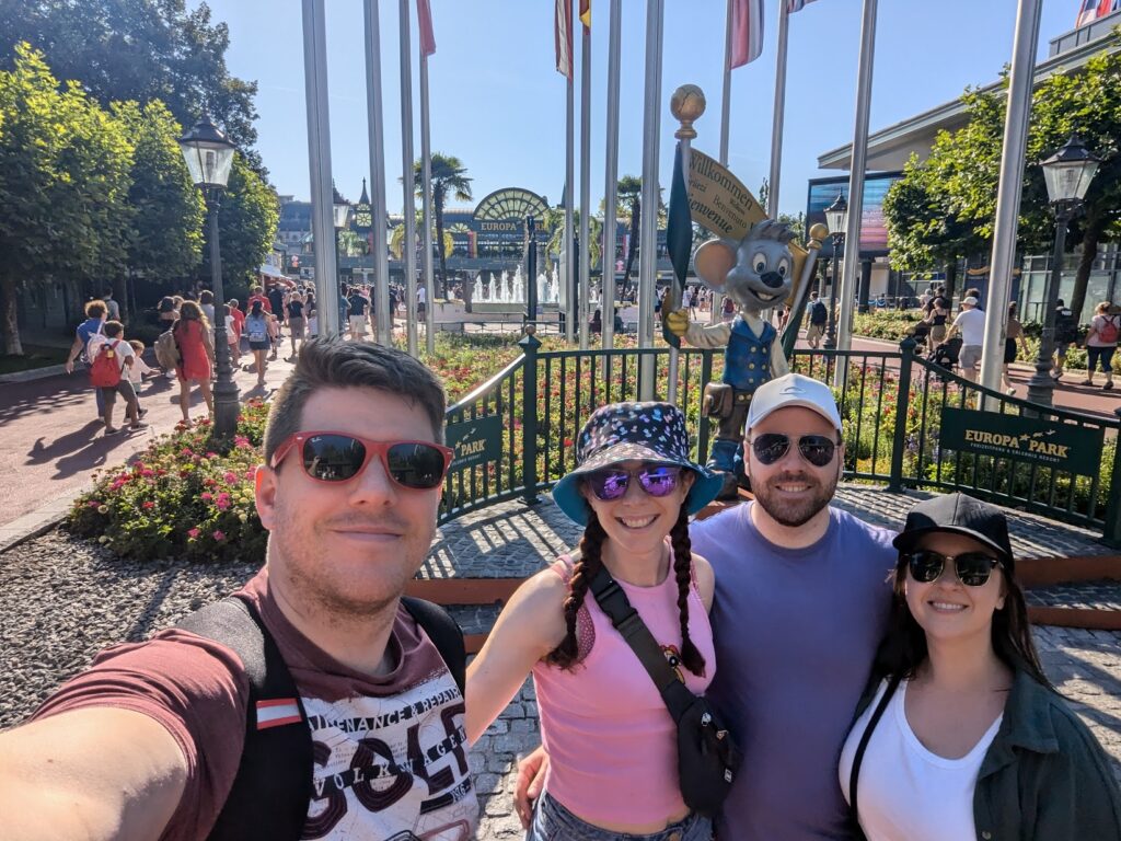 Four people outside of Europa Park's entrance